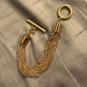 Banana republic gold plated multi-strand chain bracelet with a toggle clasp